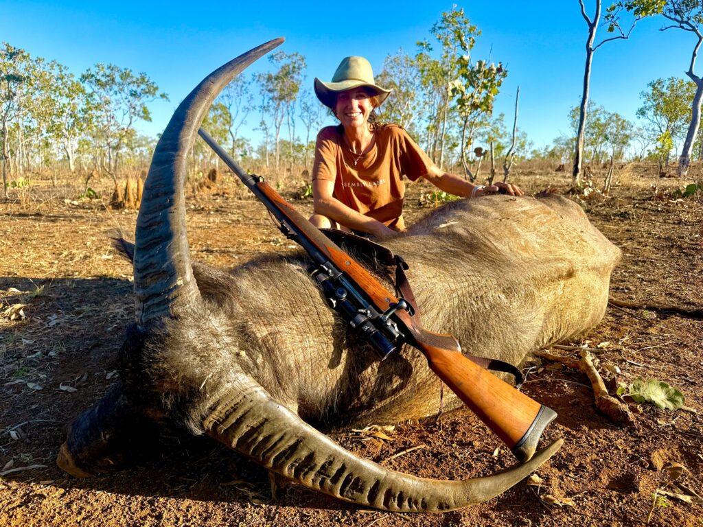 Hunter with a trophy water buffalo bull