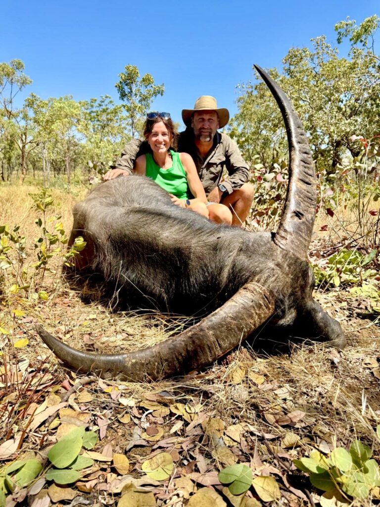 Hunters with a trophy water buffalo bull